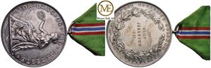 Medalje for lang og tro tjeneste. Kv.0