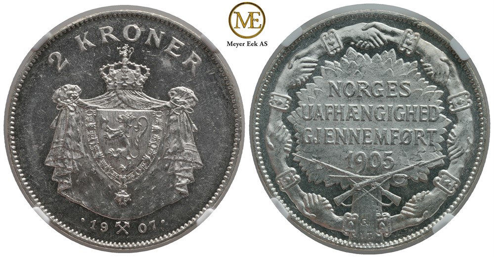 2 kroner 1907 Jub. m/gevær. Haakon VII. Gradert til MS63 hos NGC. Ex. OMG. Kv.0