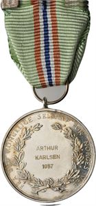 Medaljen for lang og tro tjeneste. Kv.0
